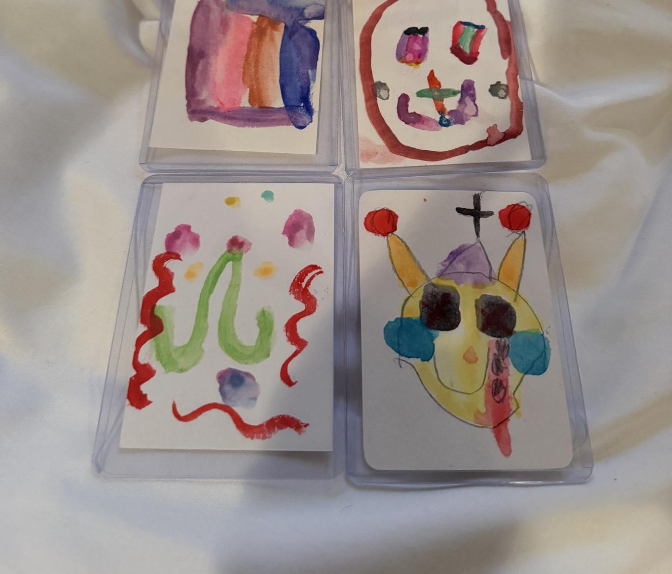 Storm's watercolor painting of purple, pink, orange and blue stripes